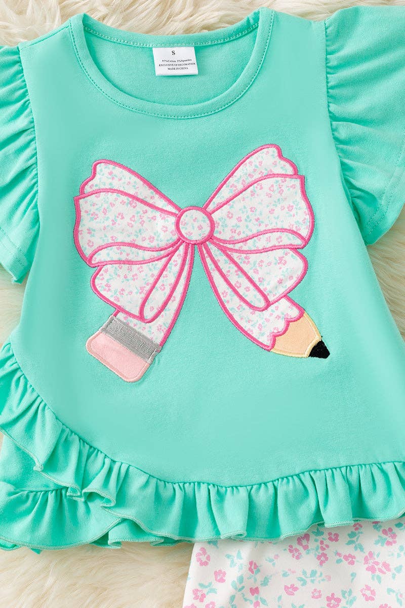 Pencil applique on mint top and floral shorts